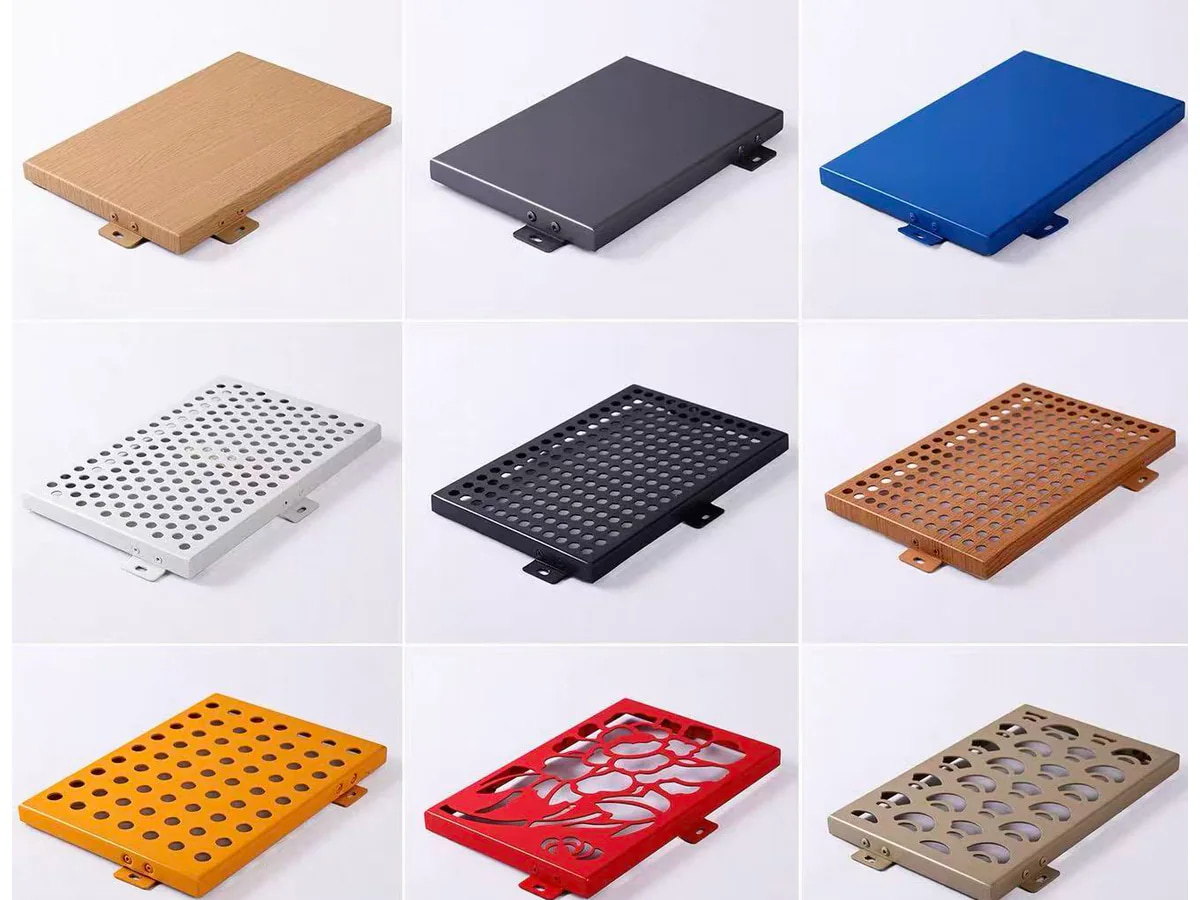 Nine real aluminium panel samples showing solid, perforated, wood-grain and decorative cut-out options